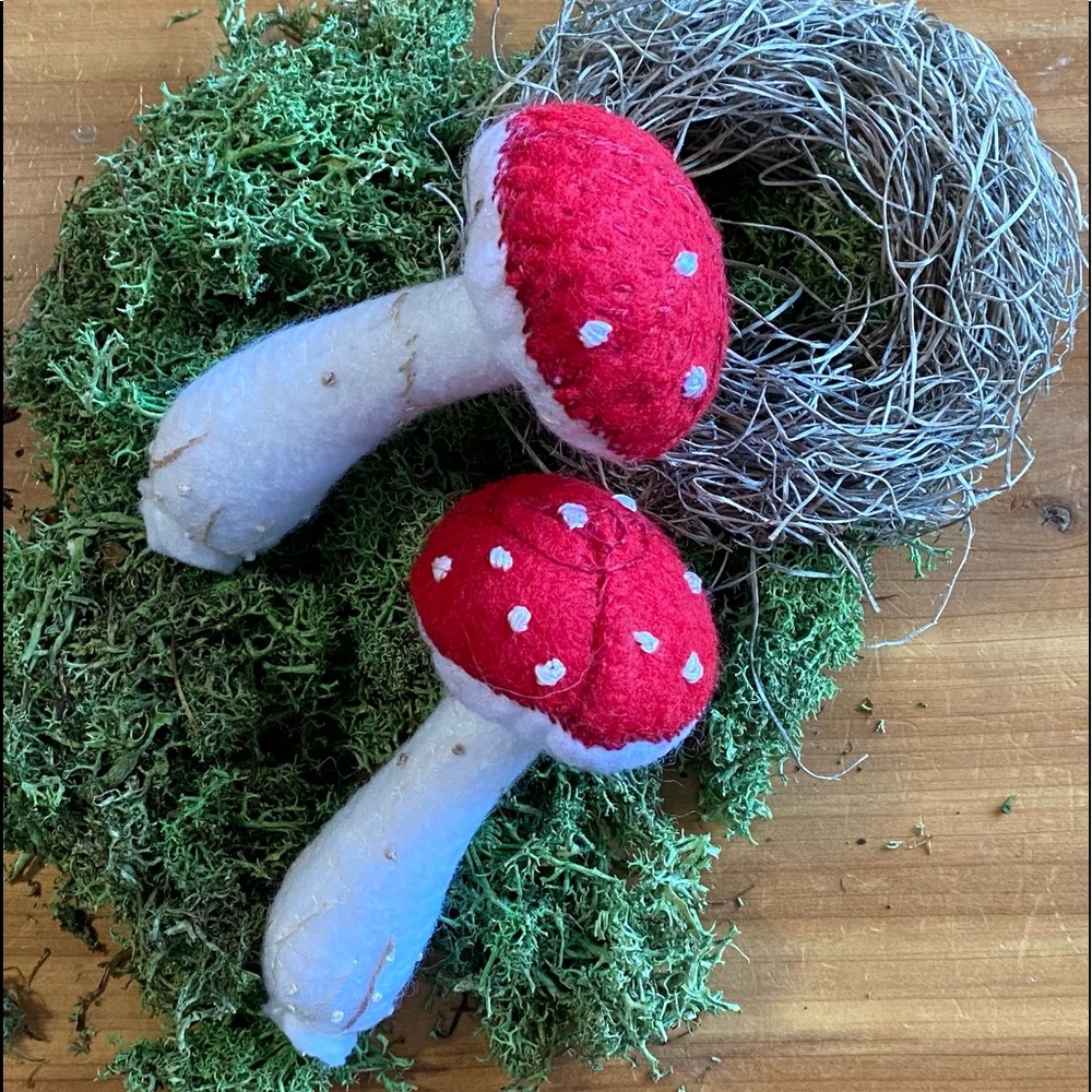 Mushroom decoration with embroidered details